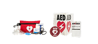 Assorted AED signage and first aid kid
